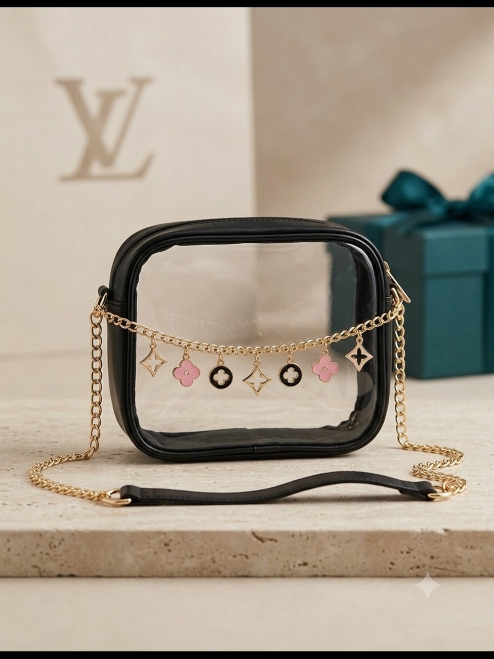 Luxury Clear Crossbody Bag with Black Trim and Pink Charm Accents